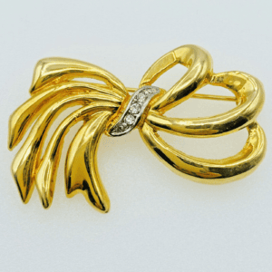 Swarovski Gold Tone Crystal Bow Brooch Signed Rhinestone Ribbon 2"