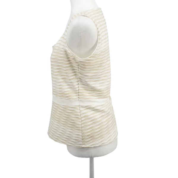 A photo of a Peplum Sleeveless Top White Cream Color White House Black Market Side View