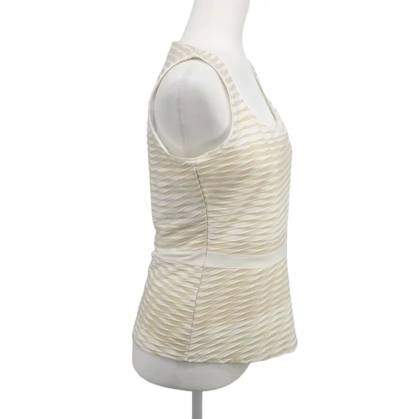 A photo of a Peplum Sleeveless Top White Cream White House Black Market Side View