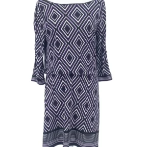WHBM mod-inspired purple, black, and white geometric print dress, size small, with boat neckline, 3/4 sleeves, and knee-length hem, displayed on mannequin