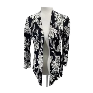 Black white paisley cardigan open-front by Cache, displayed on a mannequin. The lightweight knit features a draped hem and 3/4 sleeves with an intricate paisley pattern.