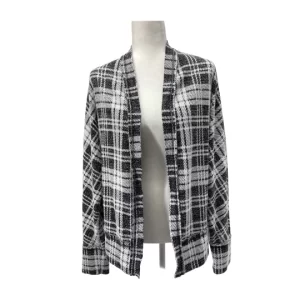 Peyton Jensen black white cardigan with plaid pattern, open front design, shawl collar, and long batwing sleeves displayed on a mannequin against a white background. Ask ChatGPT